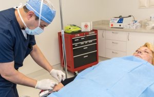 Image of a doctor administering anesthesia